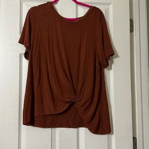 Burnt orange tee with knot on left side